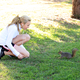 90021_Peyton_R_List_running_in_the_park___visiting_squirrels.jpg